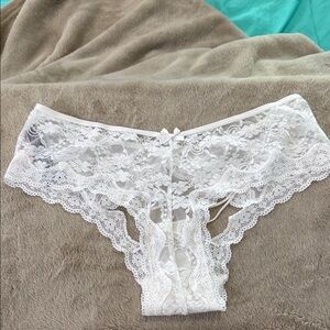 NWT Victoria's Secret Off White Lace Panties with peek a boo rear. Size Large.